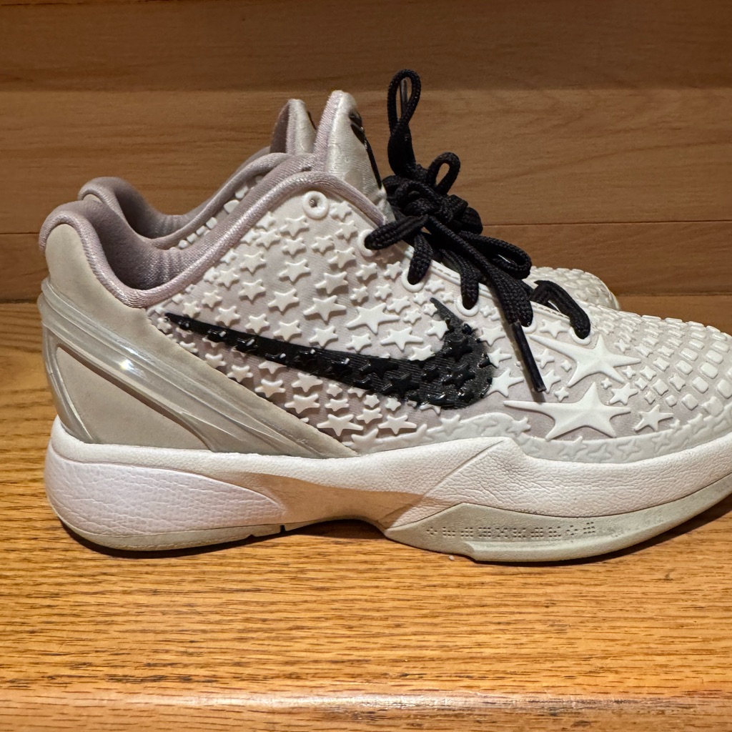 Kobe Nike Cream And Black Star-Embellished Sneakers